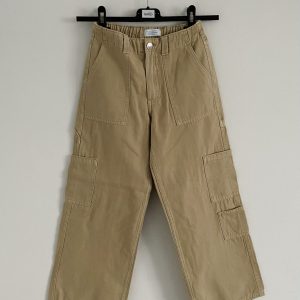 Hlače s širokimi hlačnicami Primark - št. 134